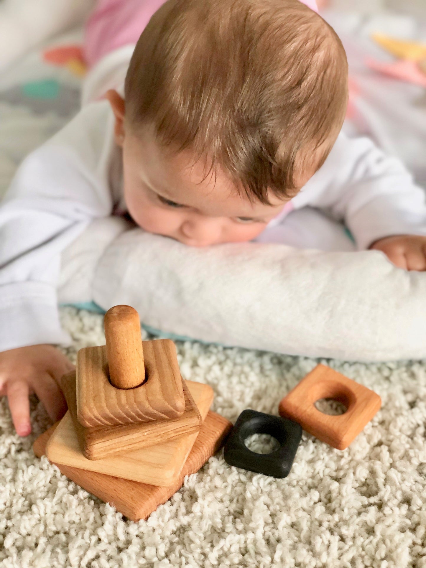 Wooden stacking toy in square shape from 6 types of wood