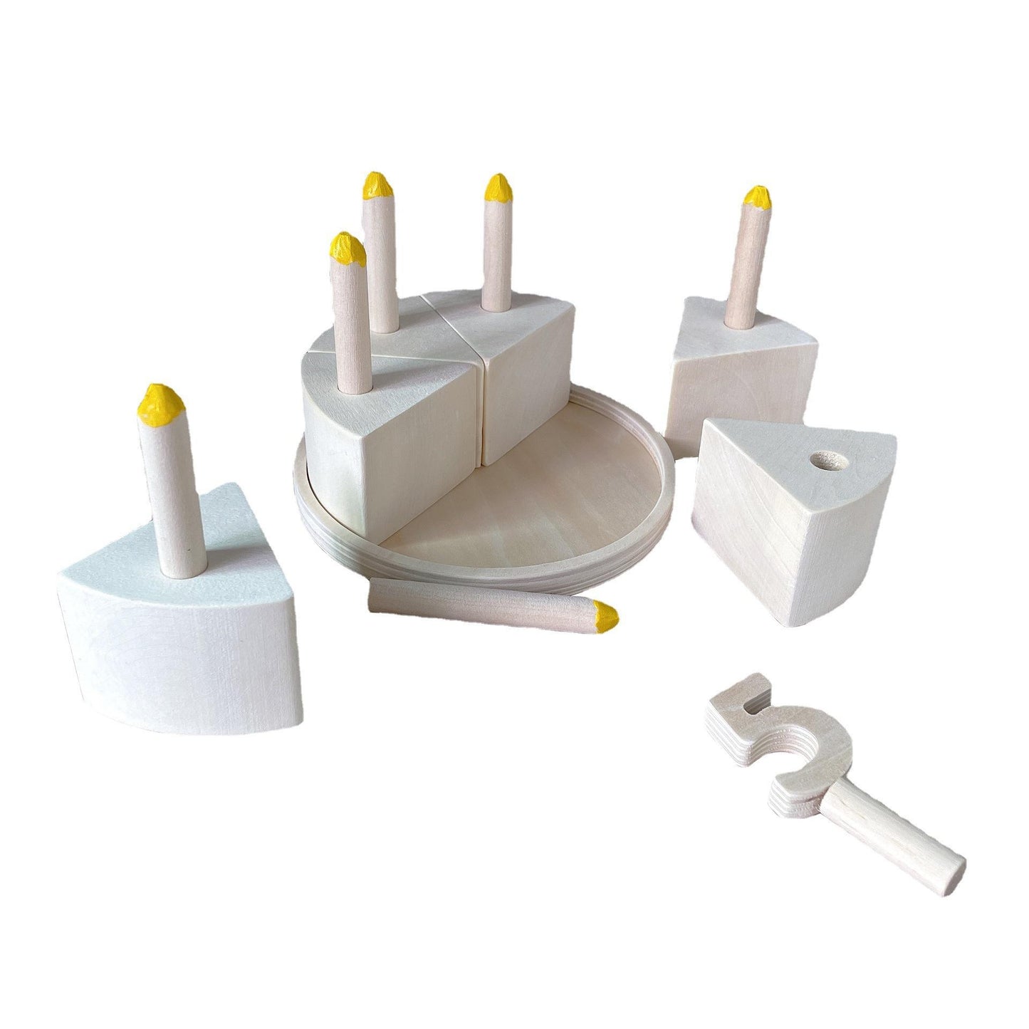 Wooden pretend cake set toy over white background